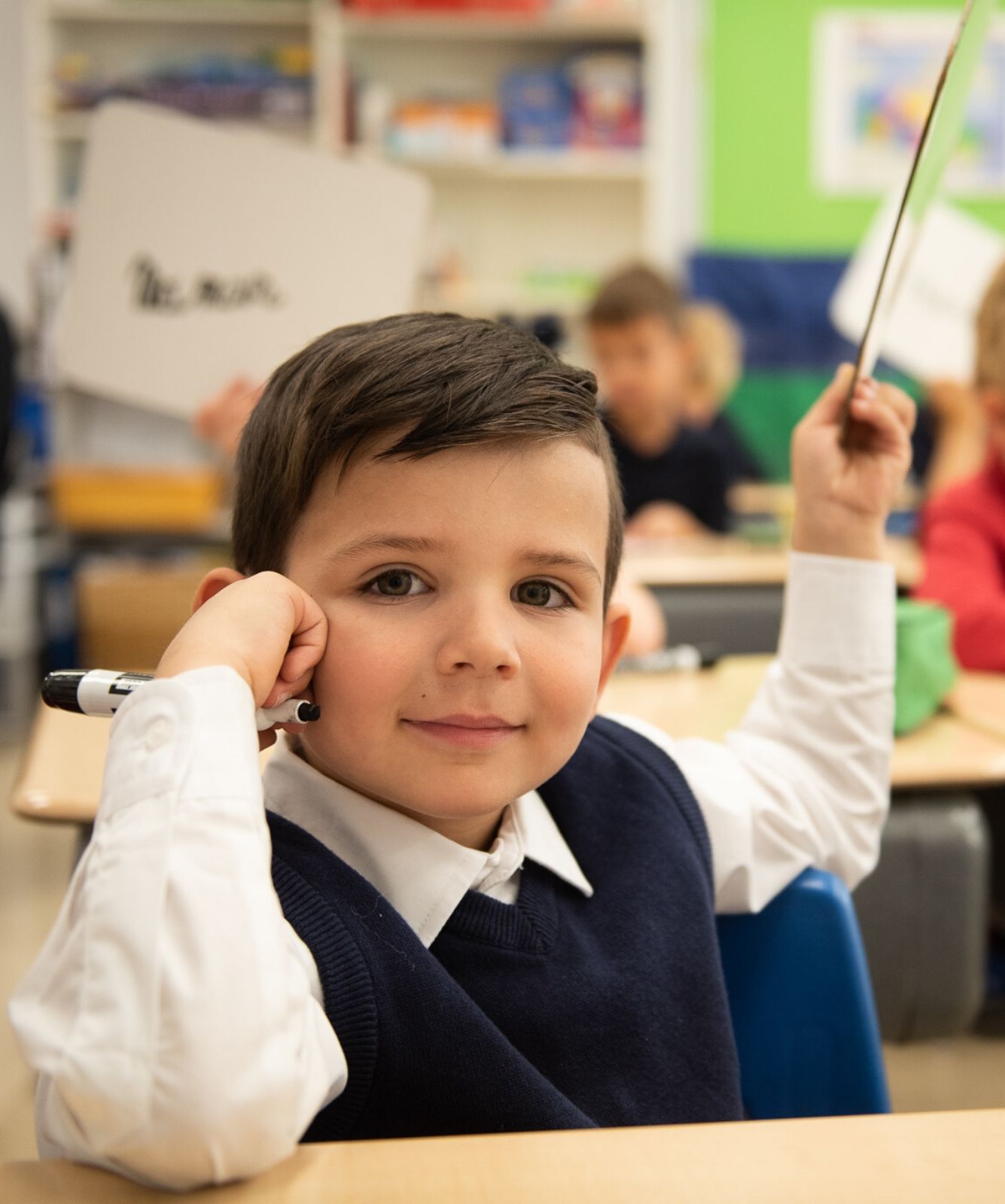 Private School boy in class